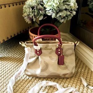 Coach mini tote with shoulder strap.